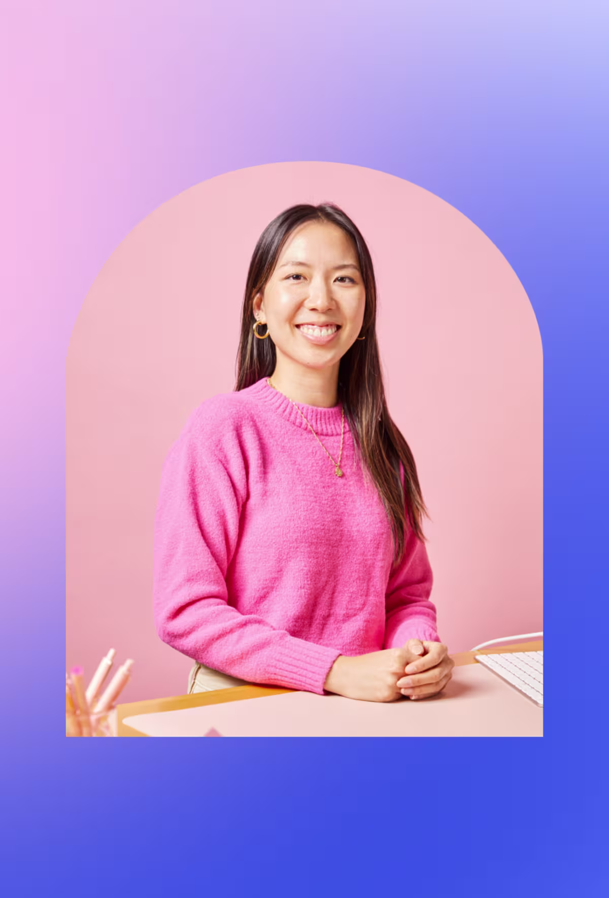  Image of a smiling woman on a pink background